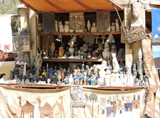 An Egyptian souvenir stand with all kinds of stone statuettes for the tourists.