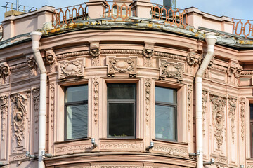 The Yakovlevs' apartment building on Nevsky Prospect. Mezzanine with putti figures. Saint Petersburg. Russia