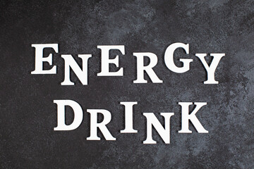 Words ENERGY DRINK on a dark background.