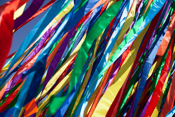Satin ribbons of different colors in large quantities