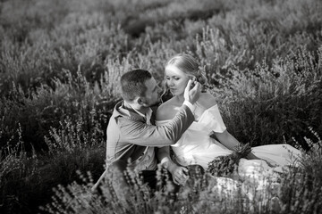 bride and groom on in the lavender field