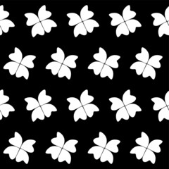 Monochrome floral seamless pattern white clover leaves on black