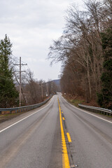 State Route 62 in Tionesta Township, Pennsylvania, USA going through woods in the Allegheny National Forest on a winter day