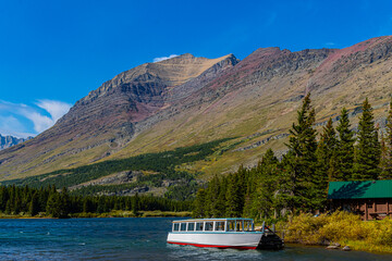 Tour Boat on Swiftcurrent Lake With Mt. Henkel in The Distance, Glacier National Park, Montana, USA