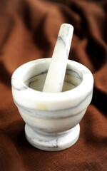 Old marble  mortar close up photo on dark background