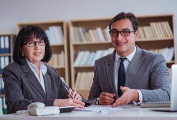 Businesspeople having business discussion in office