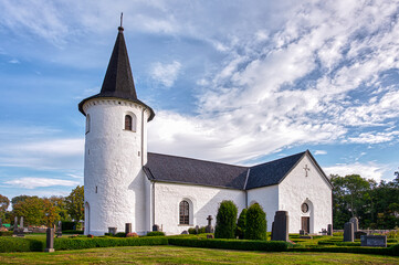 Fototapeta na wymiar the church of Bollerup with a round tower