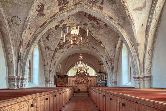 the interior of Bollerup church with gothic frescos