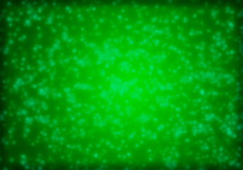 Fondo verde con motas sobre degradado.