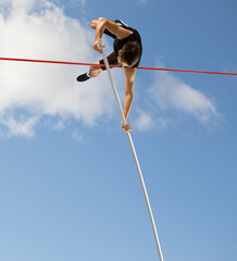 Professional pole vaulter training at the stadium