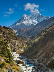 view to valley with river to summit Ama Dablam in autumn day in Nepal