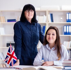 Young foreign student during english language lesson