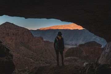 person in the cave mountains