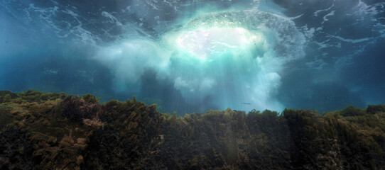 underwater photo of vortex in beautiful light