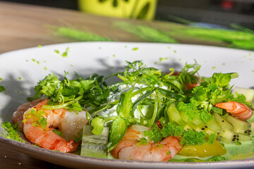 Shrimp salad with herbs, vegetables and tobiko caviar