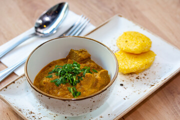 Traditional dish of Georgian cuisine chakhokhbili from chicken, vegetables and walnuts