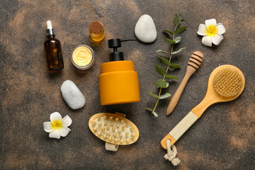 Composition with natural cosmetics and spa accessories on grunge background