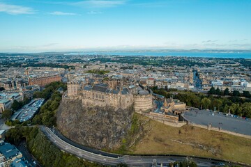 Top aerial view of Edinburgh city overlooking the Old Town. Edinburgh Castle has been Edinburgh's dominant landmark. Edinburgh Castle is one of the most important and historic castles in Scotland.