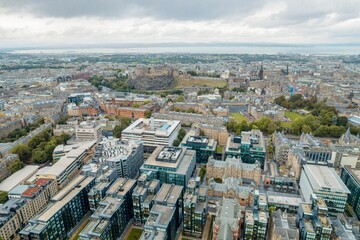 Fototapeta premium Edinburgh is built beside the vibrant waters of the North Sea, on land cut through with gorgeously verdant valleys, these picturesque towers on Castle Hill are one of Scotland’s top tourism spots