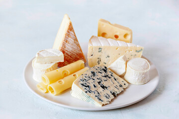 Cheese plate with different types of french cheese
