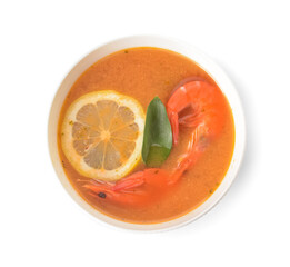 Bowl of spicy Thai soup on white background