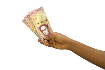 Fair hand holding 3D rendered 20000 venezuela Bol&iacute;vares notes isolated on white background
