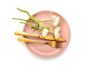 Simple table setting and ranunculus flowers on white background