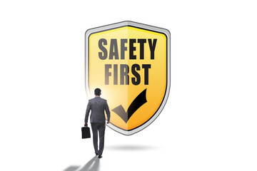 Safety first badge with business people