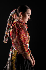 Young beautiful slovak woman in traditional dress. Slovak folklore