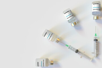 Clock face made with vaccination text on vials and syringes. Conceptual medical 3D rendering