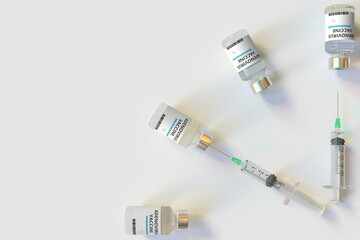 Clock face made with adenovirus vaccine vials and syringes. Vaccination time concept. Conceptual medical 3D rendering