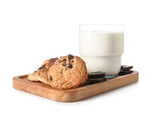 Board with tasty homemade cookies and glass of milk on white background