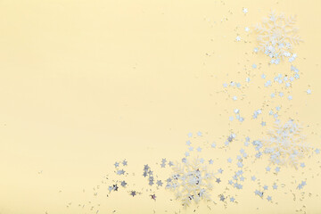 Beautiful confetti on beige background