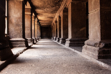 Interior view of pillars at Pataleshwar cave temple in Pune, India.
