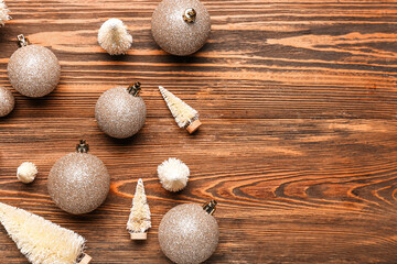 Bright Christmas balls on wooden background
