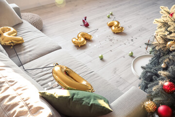 Interior of messy room after Christmas party