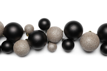 Composition with different Christmas balls on white background