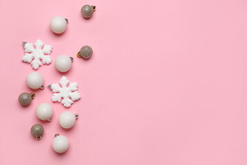 Different Christmas decorations on pink background