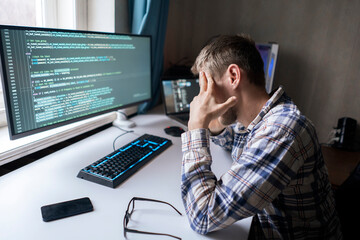 unhappy tired male manager feeling stress during work process