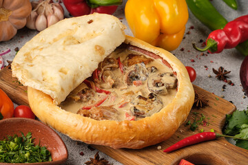 Chasushuli under the dough. Lots of vegetables