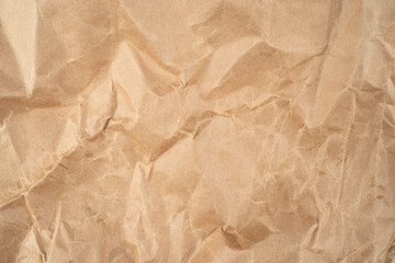 Fototapeta premium Old paper background. Old crumpled vintage paper texture. Paper surface pattern.