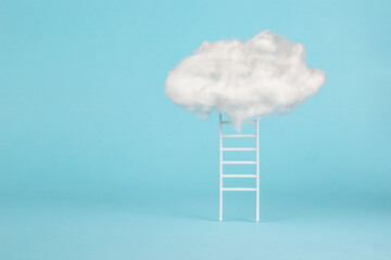 A white staircase ending in clouds on a blue background.