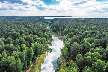 The river is separate and surrounded by forest. Berdsk, Russia