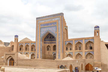 The Allakuli Khan Madrassah. Ichan Kala (or Itchan Qala is walled inner town of the city of Khiva, a UNESCO World Heritage Site), Khiva city, Uzbekistan.