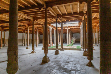 Interior of the Juma Mosque and its wooden columns. Ichan Kala (or Itchan Qala). Khiva, Uzbekistan.