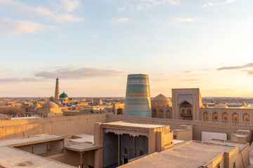 Beautiful view from Kunya Ark Citadel on the Kalta Minor and Islam Khoja minaret. Ichan Kala (or...