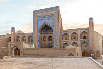 Fototapeta na wymiar The Allakuli Khan Madrassah. Ichan Kala (or Itchan Qala is walled inner town of the city of Khiva, a UNESCO World Heritage Site), Khiva city, Uzbekistan.