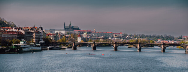 Panoramic view of Prague cathedral castle svateo welcomes and vltava river and bridges to it in the center of prague during the day