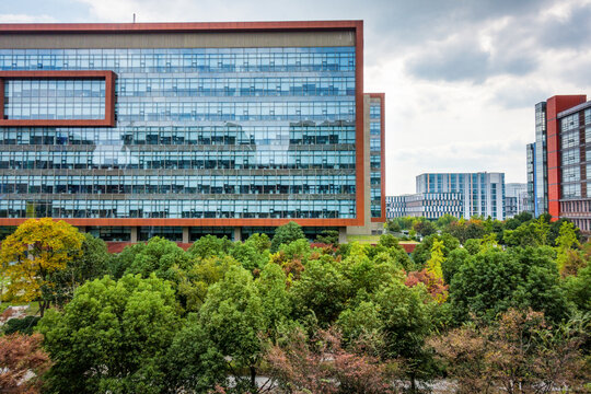 Park with trees and fountains in front of the Business Center