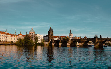 Panoramic view of Charles Bridge on the Vltava river in the center of Prague on a sunny day 2021...